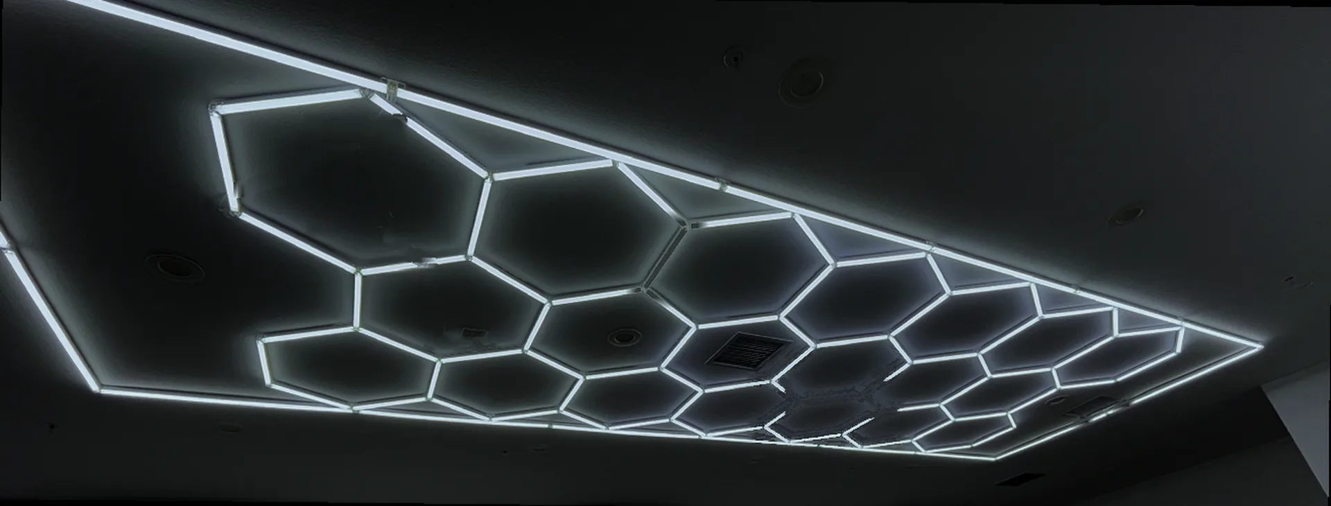 Hexagon LED honeycomb ceiling inside The Butchers Barbershop